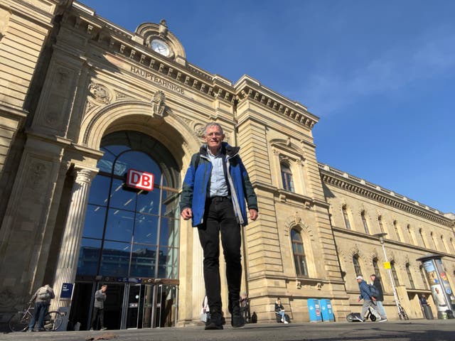 <p>Cheap trick: Simon Calder at Magdeburg station in Germany, as part of his ?48 rail trek</p>