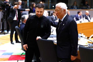 European Council President Antonio Costa, right, speaks with Ukraine's President Volodymyr Zelensky during a round table meeting at an EU Summit in Brussels