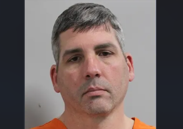 <p>James Tompkins, 46, was arrested on DUI and negligent child abuse charges after he allegedly was driving drunk while taking his two young sons to Disney World</p>