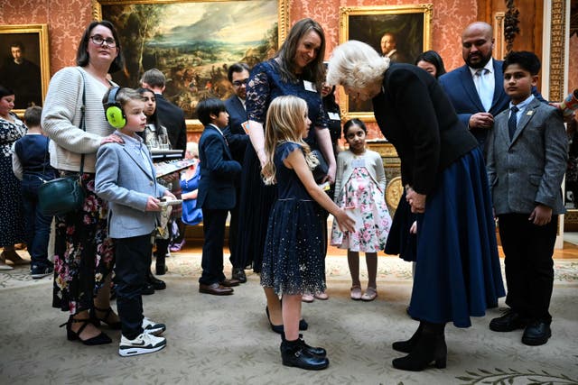 The Queen meets participants during a reception with finalists, judges and celebrity readers, to celebrate the final of BBC’s creative writing competition 500 Words (Justin Tallis/PA)