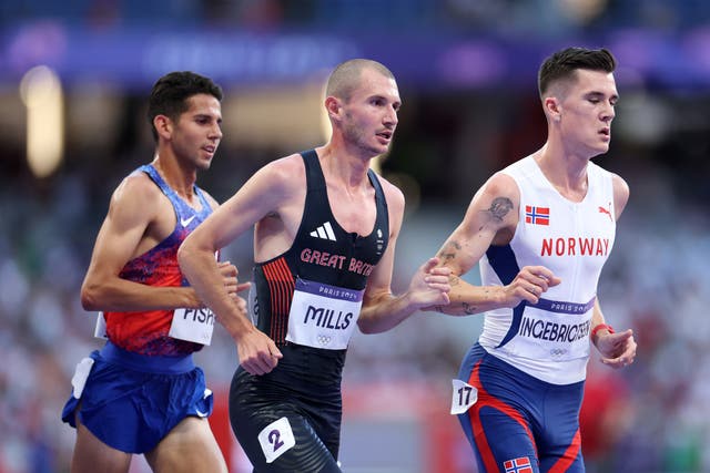 <p>George Mills racing against Jakob Ingebrigtsen at the Paris Olympics</p>