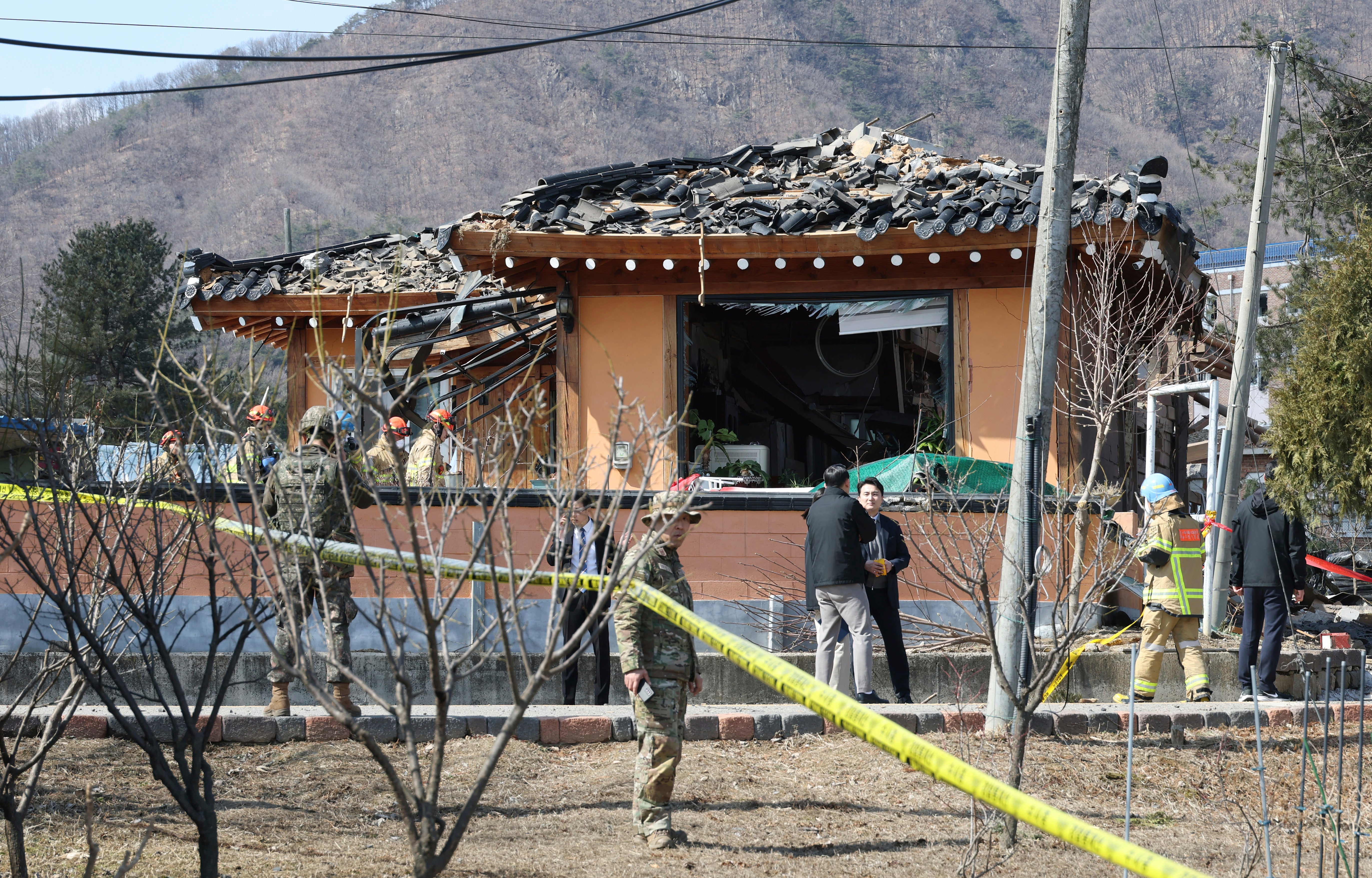 South Korea army soldiers stand guard near a bomb accident site