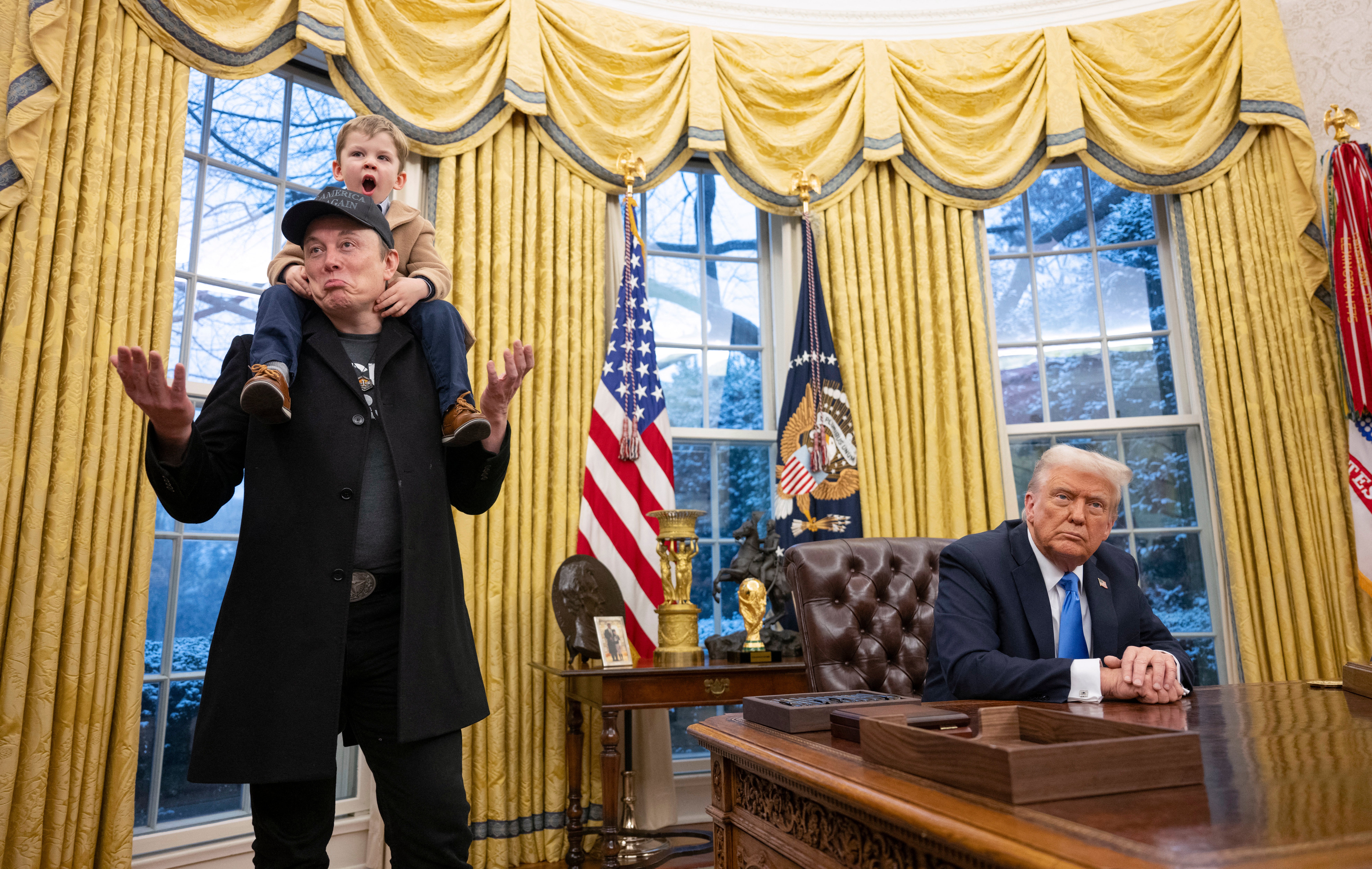 Trump and billionaire special adviser Elon Musk give a press conference with Oval Office’s gold drapes as a backdrop