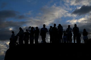 Onlookers view Brisbane from the Mount Coot-tha Summit Lookout