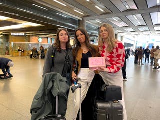 Ruby Mowle, Francesca Birch, and Charlotte Liddell, passengers at St Pancras International station in London