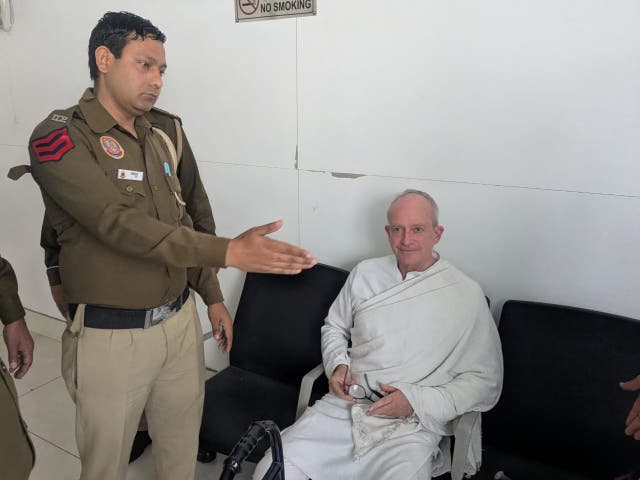 <p>Christian Michel sitting with his crutches in Delhi's Rouse Avenue court after making a submission regarding his safety</p>