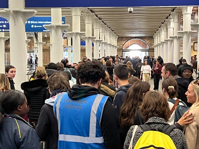 <p>Way out? Passengers queuing for customer service at London St Pancras International </p>
