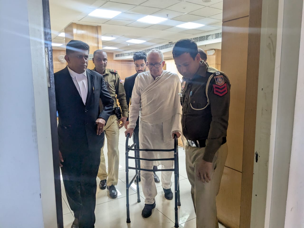 Christian Michel leaving the courtroom with his lawyer Aljo K Joseph on 7 March 2025