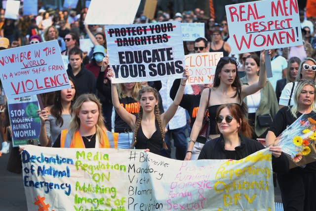 <p>Demonstrators take part in a national rally against violence towards women in April 2024 in Sydney, Australia</p>