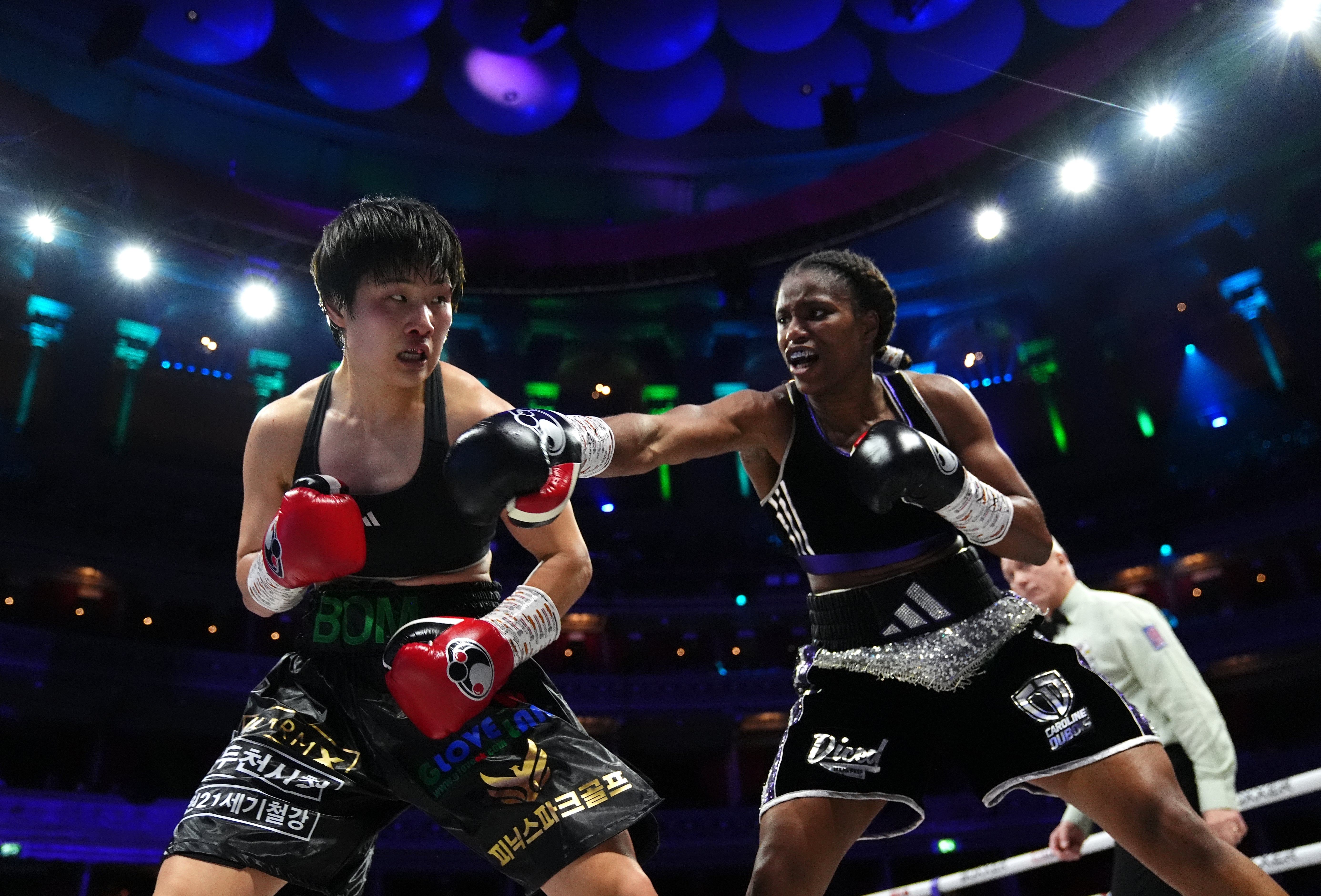 Caroline Dubois (right) in action against Bo Mi Re Shin at the Royal Albert Hall
