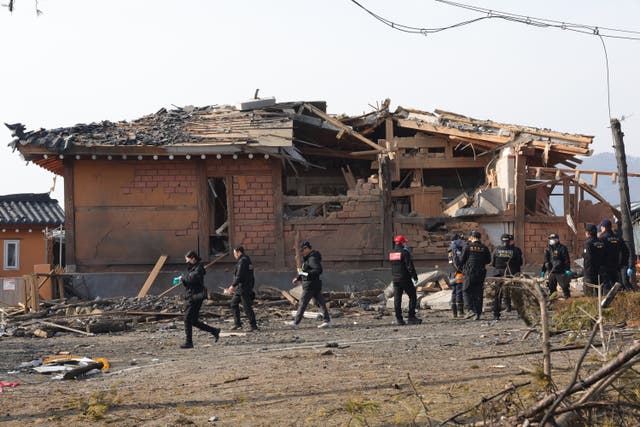 <p>Investigators examine the site of an accidental fighter jet bombing in Pocheon village, South Korea</p>