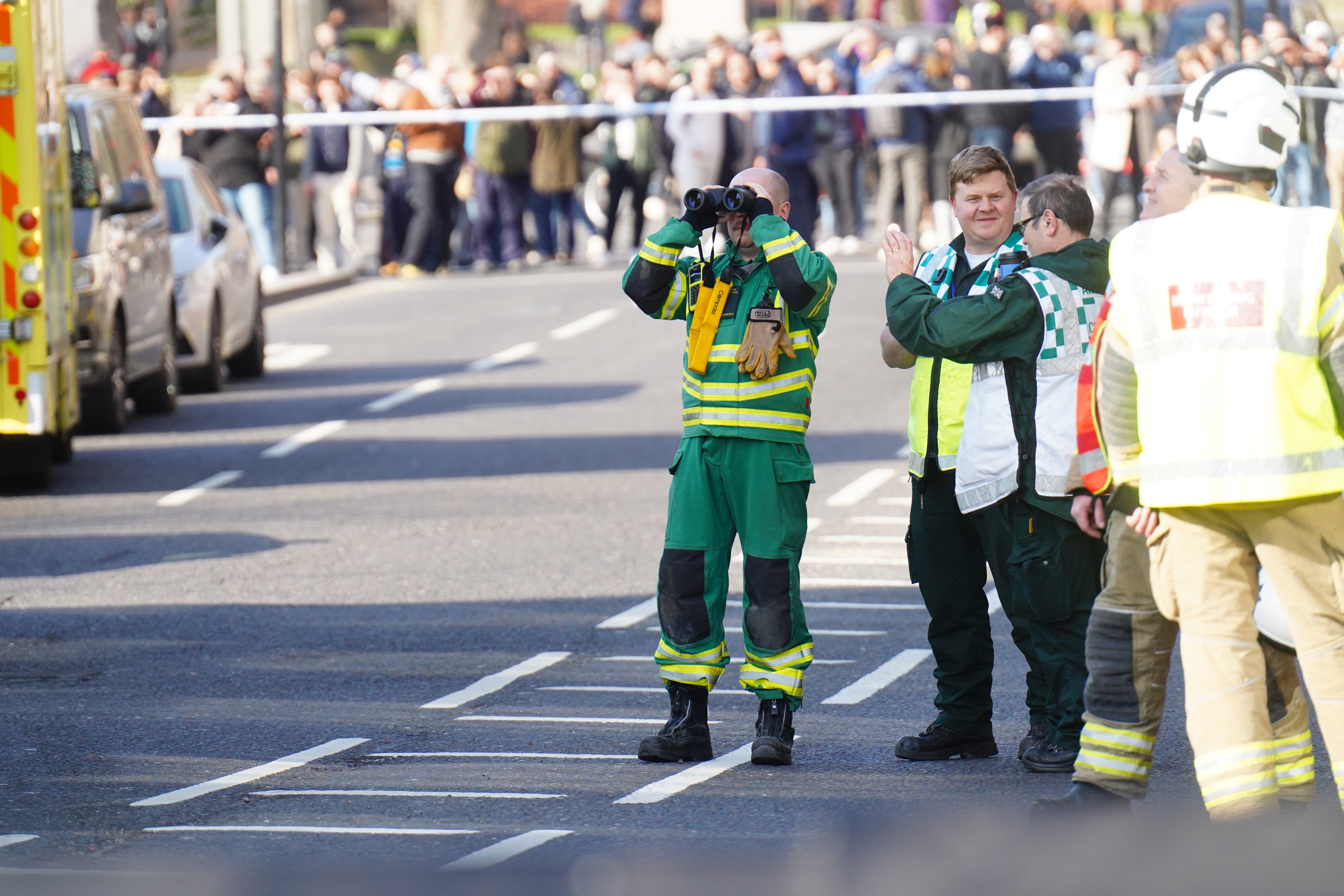 A man holding a Palestinian flag has climbed the building that houses Big Ben in front of shocked onlookers as emergency services rushed to the scene