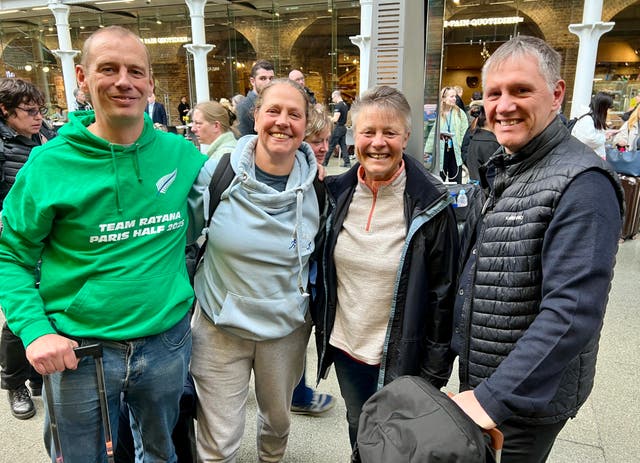 <p>Bon voyage? Aidan Kelly, Ali Lapper, Carol Marsh and Lee Warwick at London St Pancras International, keeping cheerful as they tried to figure out how to reach Paris</p>