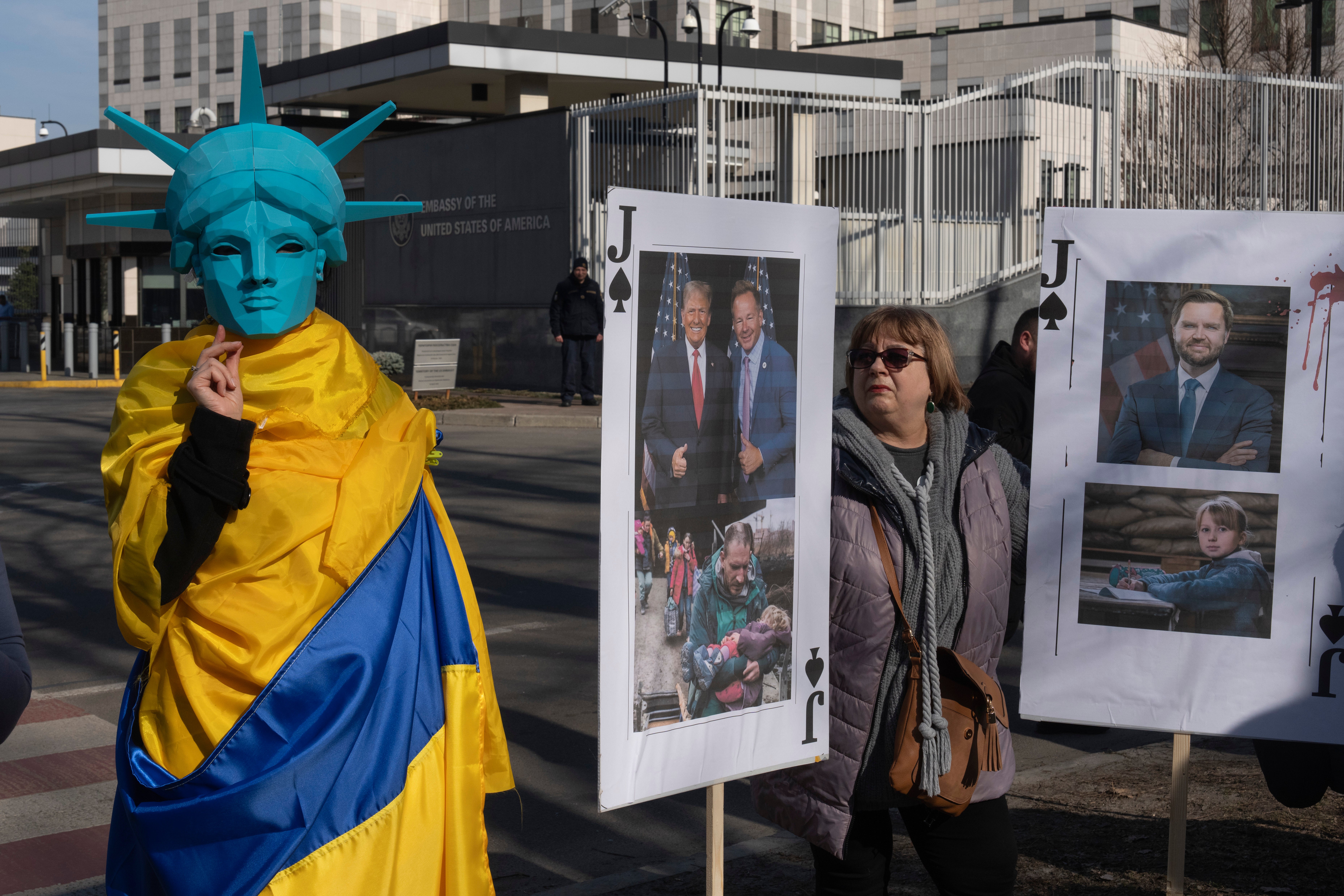 People protest against Donald Trump's policy on Ukraine in front of the US Embassy in Kyiv on Saturday