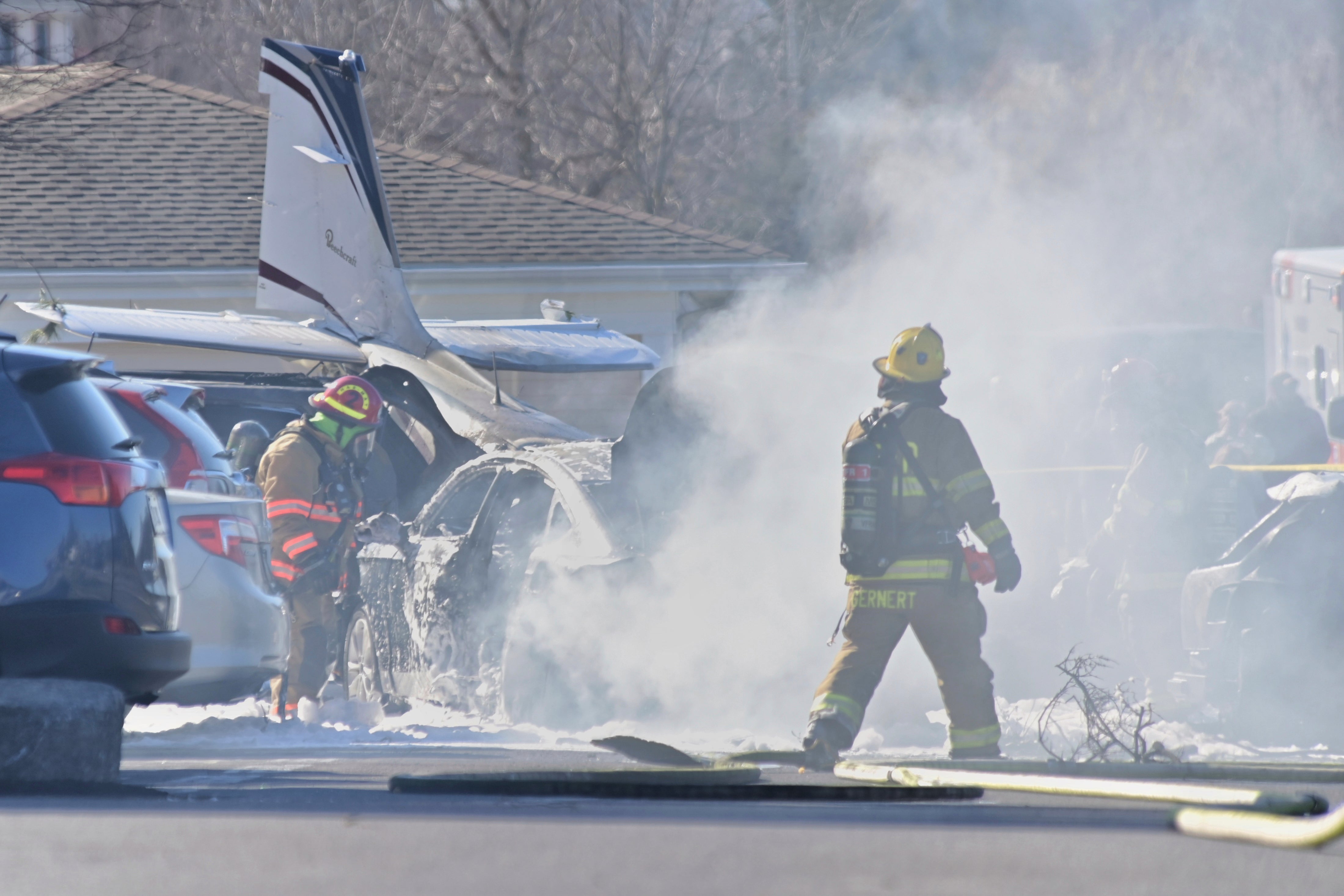 Firefighters respond to the scene of a small plane crash in Manheim Township near the Lancaster Airport in Pennsylvania on March 9