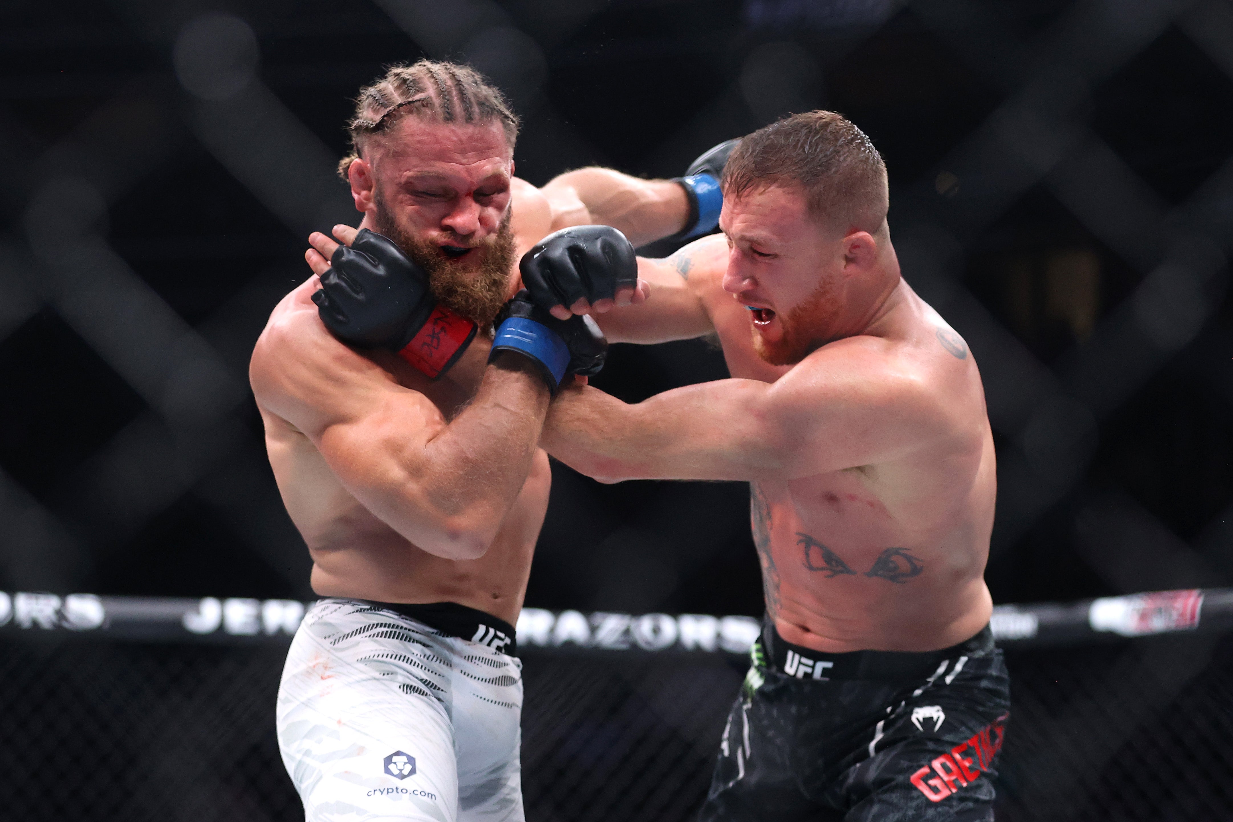 Justin Gaethje (right) during his second win over Rafael Fiziev, in March