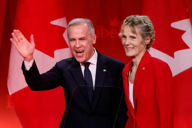 <p>Former Bank of Canada and Bank of England governor Mark Carney waves next to his wife Diana Fox after winning the race to become leader of Canada's ruling Liberal Party and will succeed Justin Trudeau as Prime Minister, in Ottawa, Ontario, Canada</p>