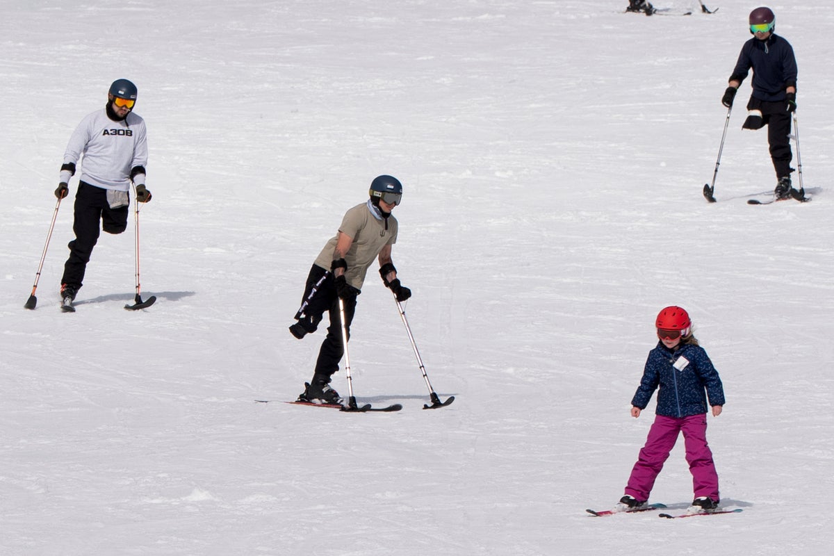 Ukrainian war veteran amputees learn adaptive skiing in Oregon