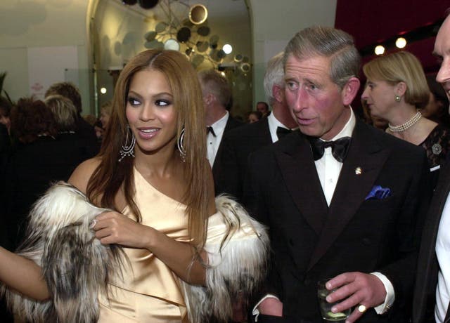 <p>Charles meets Beyonce during the Fashion Rocks For The Prince’s Trust event at the Royal Albert Hall in 2003, where she performed Crazy in Love</p>