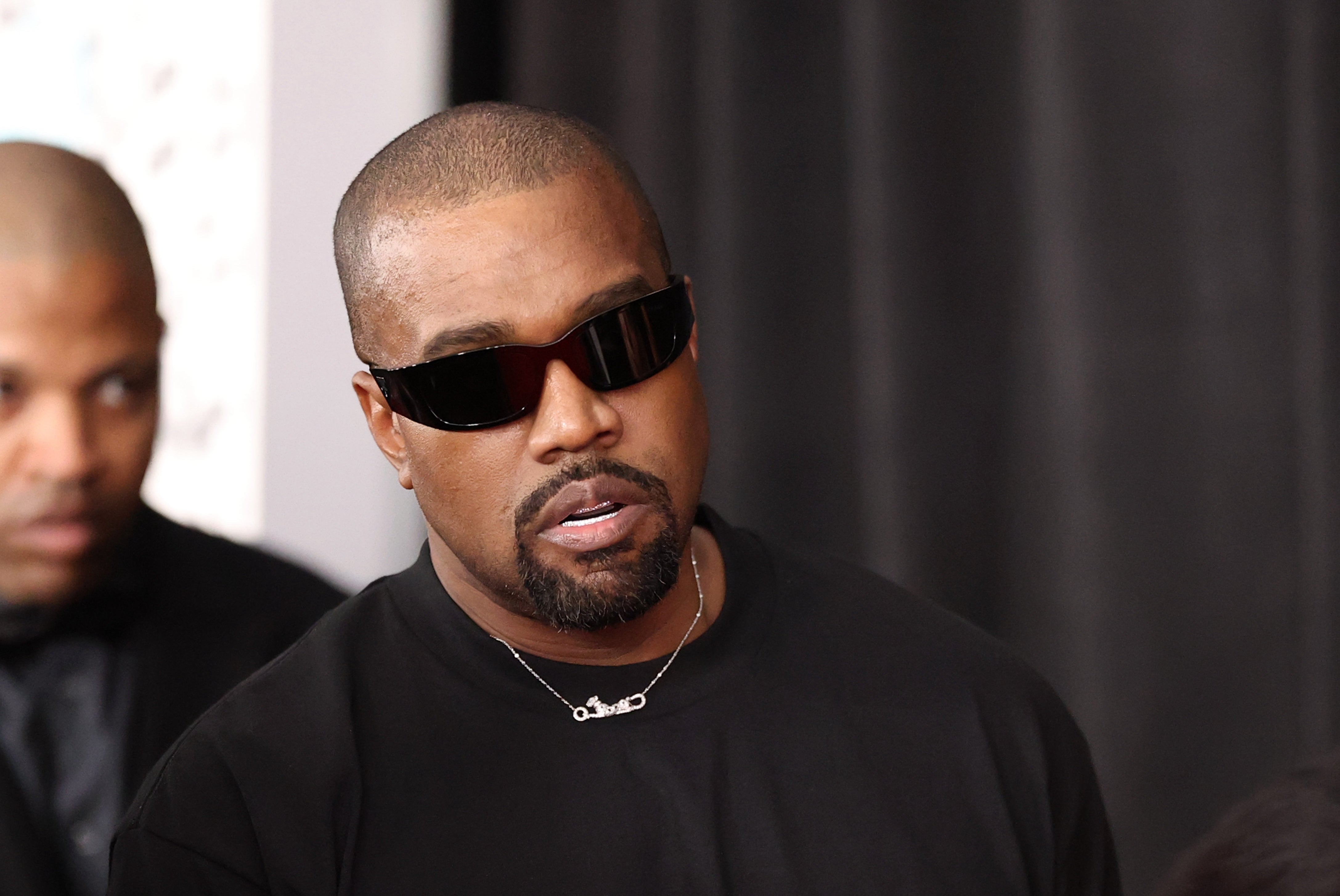 Kanye West's recent Instagram post of a person in a Ku Klux Klan outfit was removed for violating community guidelines