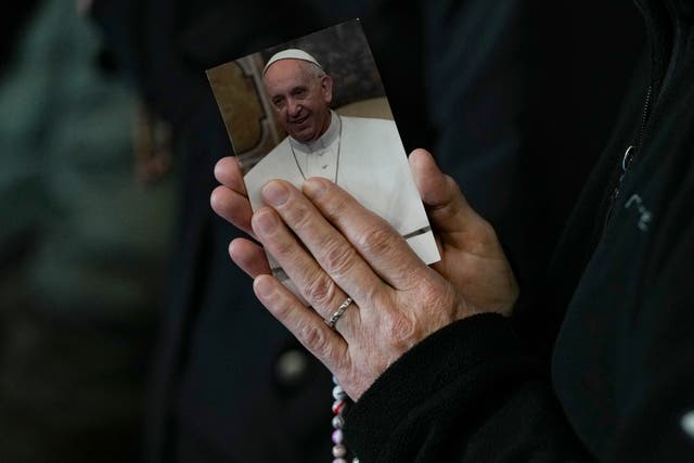 <p>A nun attends a rosary prayer for Pope Francis</p>