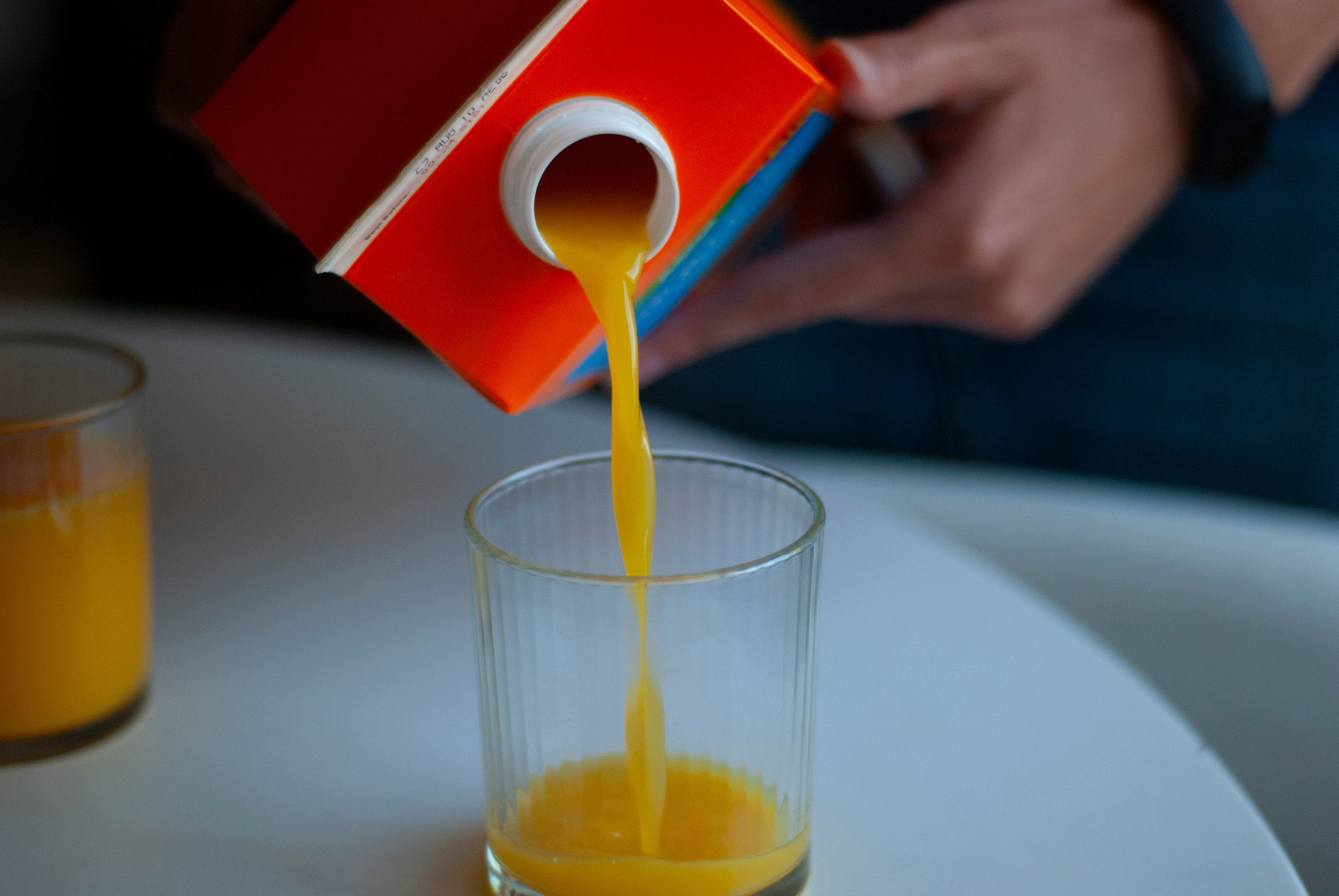 Liquid sugar, sky-high food miles and a splash of deforestation – the real taste of OJ