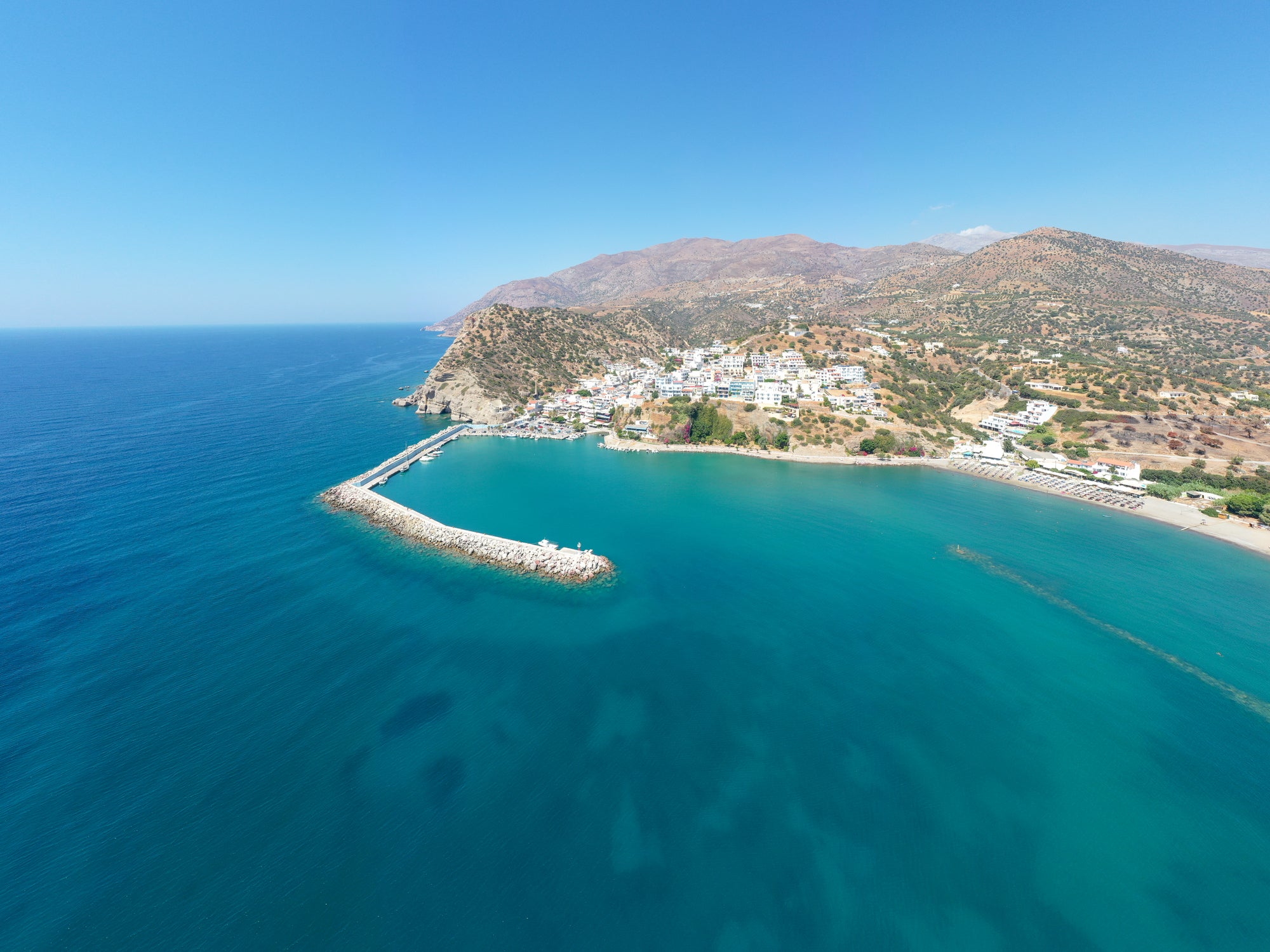 The picturesque village of Agia Galini is perched on the slopes the hilly landscape