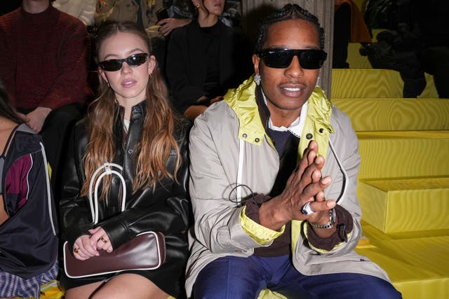 Sydney Sweeney, left, and A$AP Rocky attend the Miu Miu Fall/Winter 2025-2026 Womenswear collection presented Tuesday, March 11, 2025 in Paris. (Photo by Scott A Garfitt/Invision/AP)