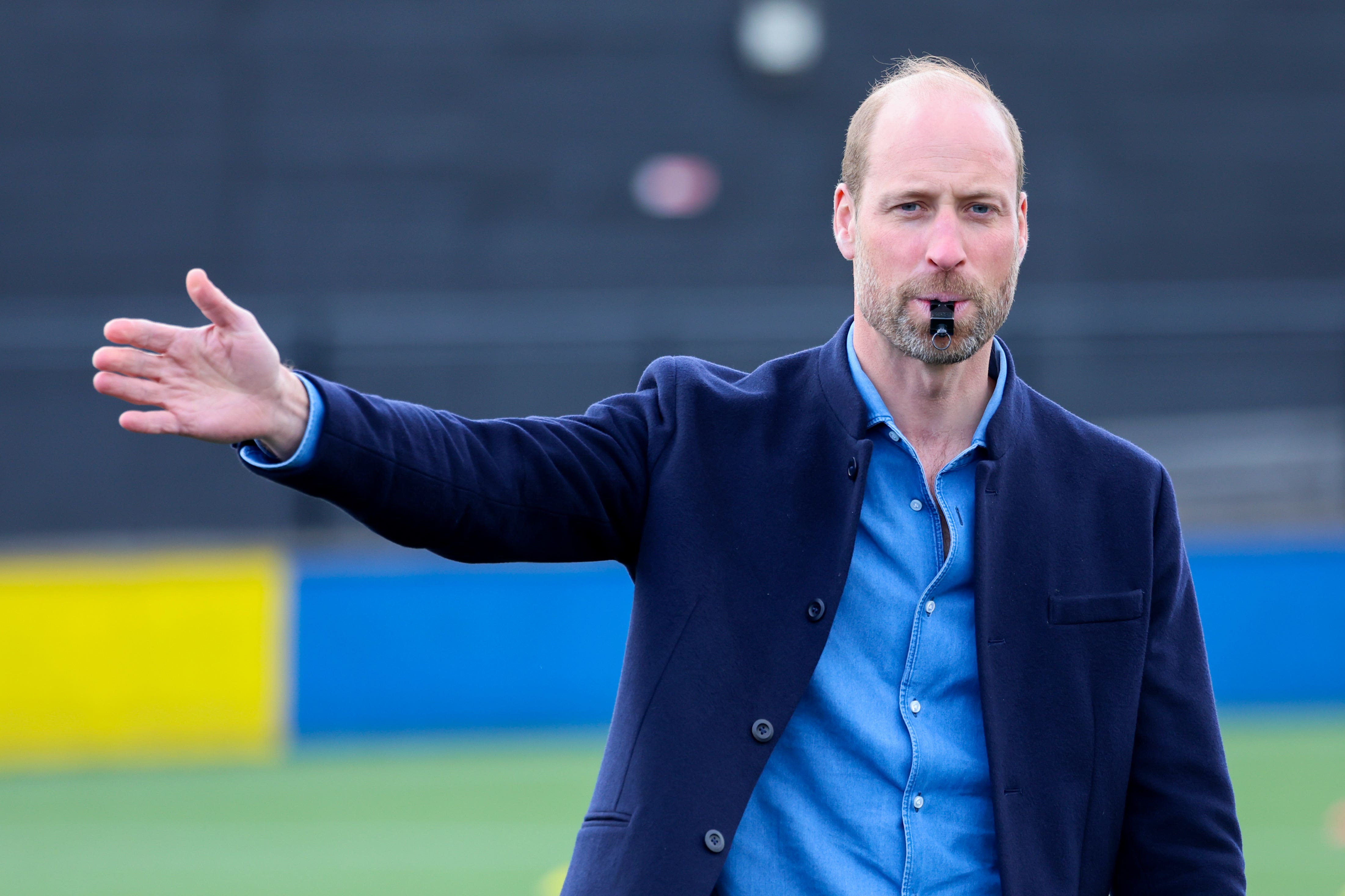 The Prince of Wales blows the referee’s whistle (Chris Jackson/PA)