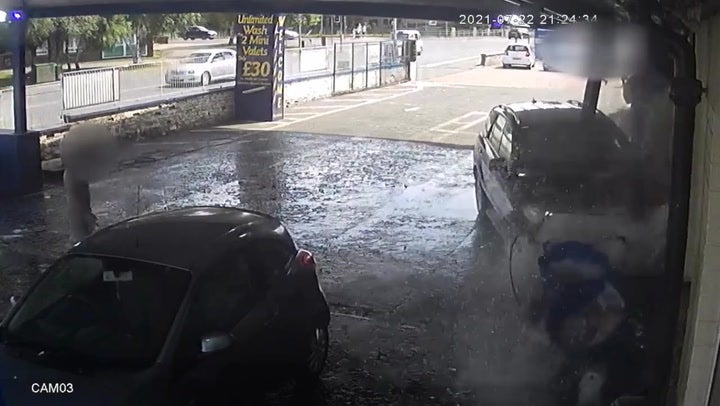 <p>Moment father drives Mercedes SUV into own son at a car wash over ‘cheating’ row.</p>