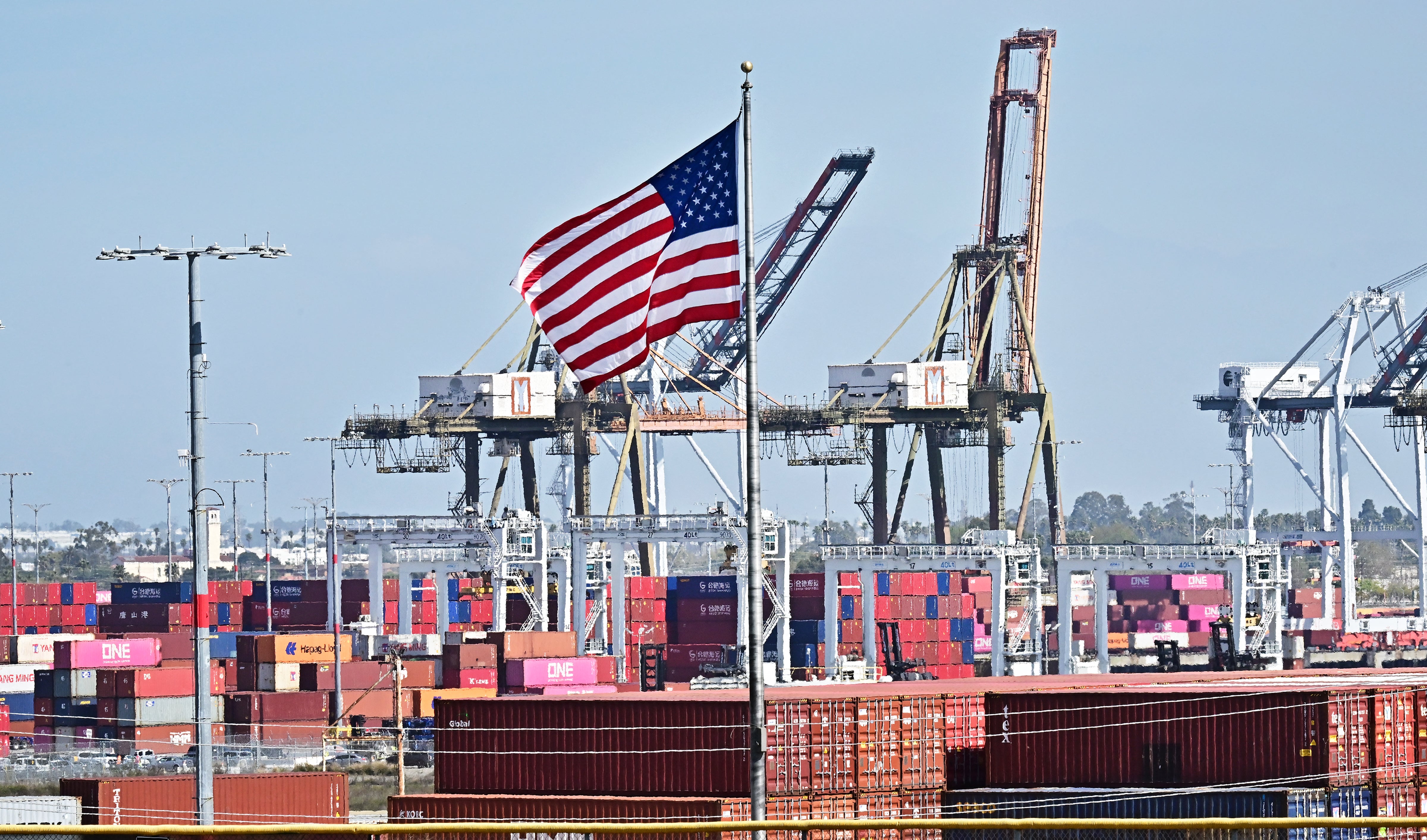 Shipping containers are stacked high at the Port of Long Beach on March 4, 2025 in Long Beach, California. The European Union is set to retaliate for U.S. tariffs on steel and aluminum