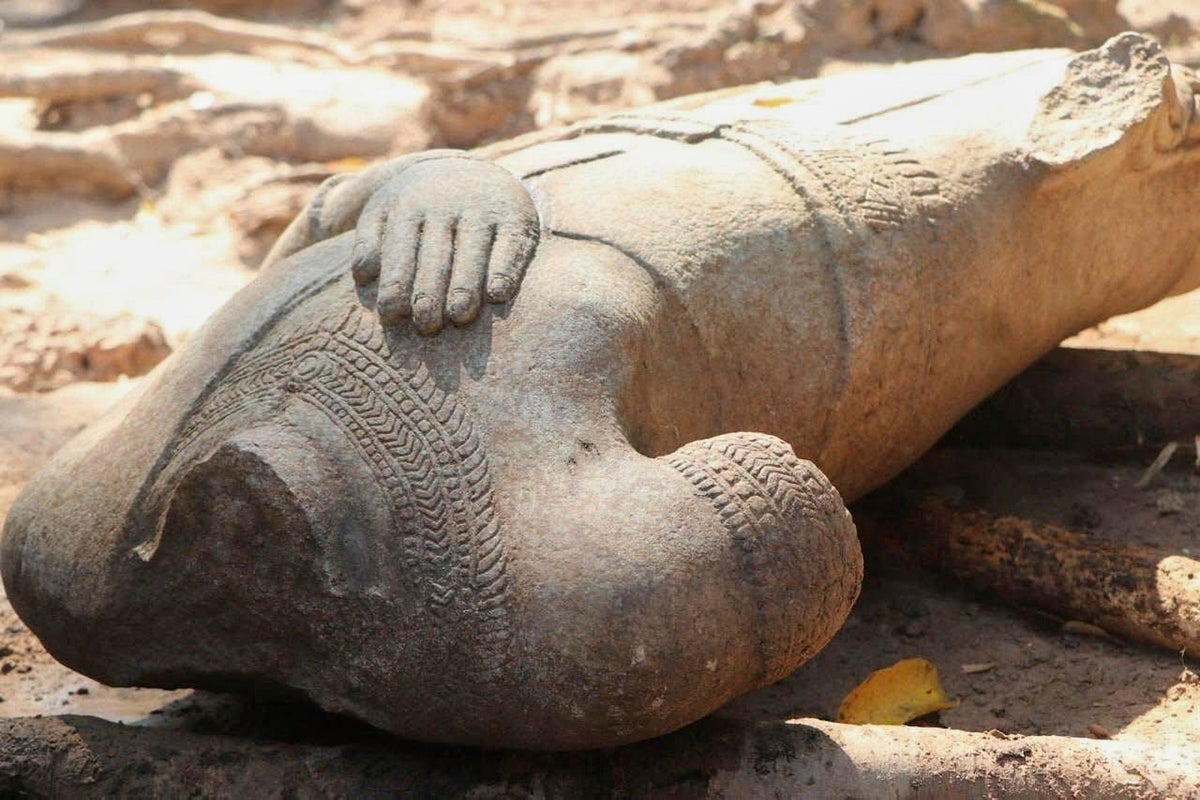 Archaeologists unearth centuries-old statue in Cambodia’s Angkor temple