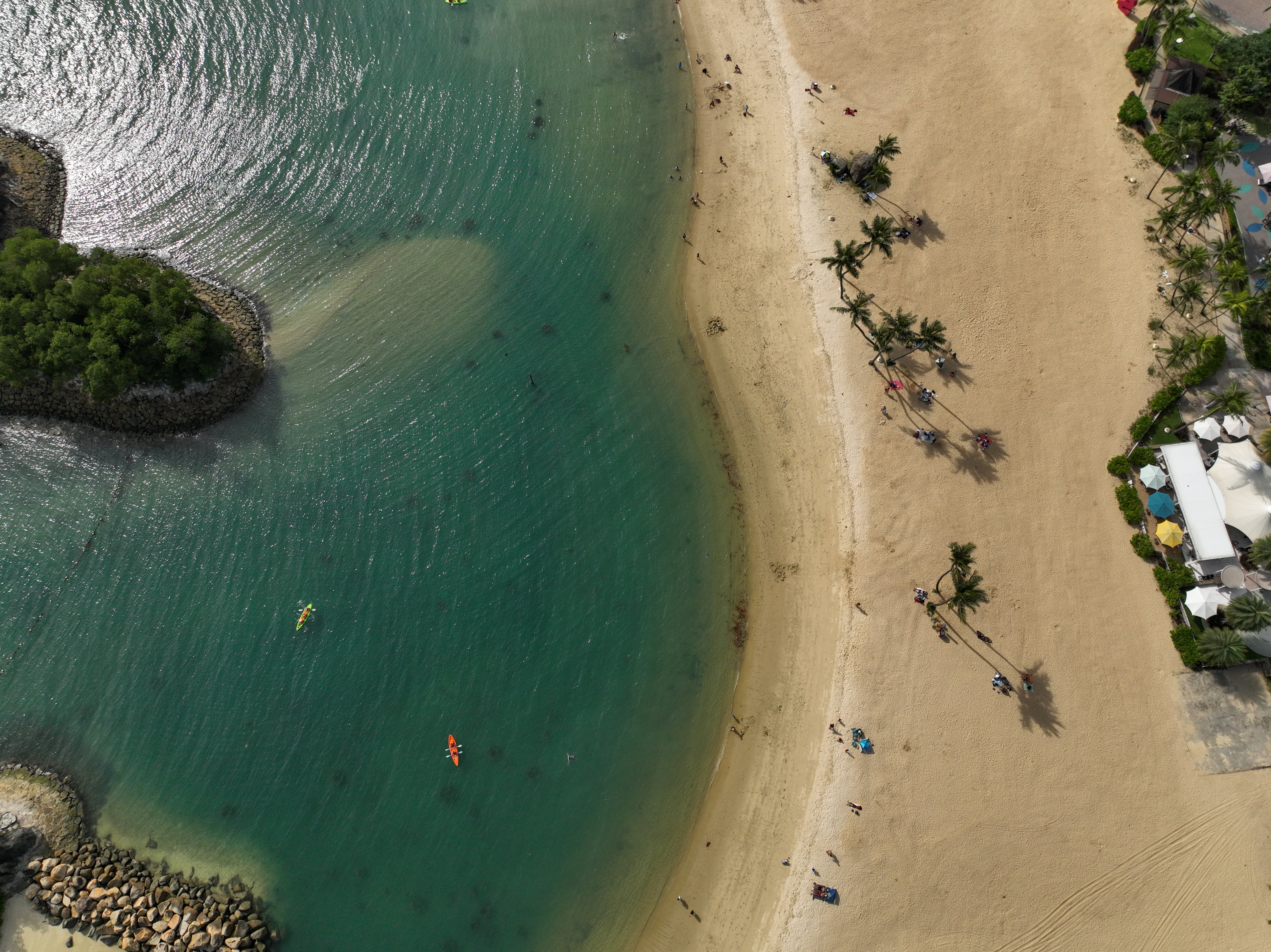 Head to the idyllic surrounds of Siloso Beach to paddleboard in its clear, calm waters