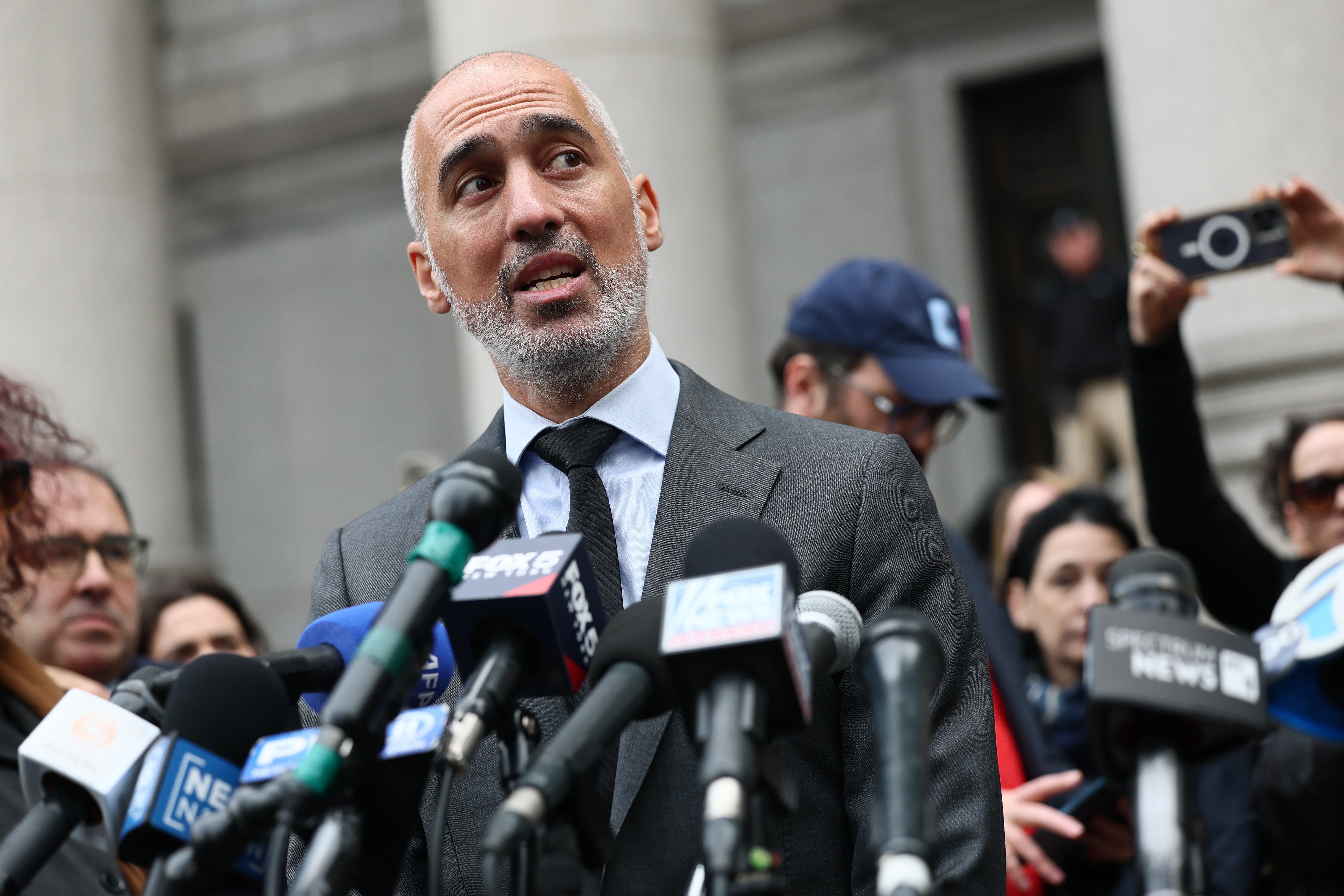 Mahmoud Khalil's lawyer Ramzi Kassem speaks to journalists on March 12 after a first hearing in a critical case to determine if the Trump administration can expel a green card holder on pro-Palestine demonstrations at Columbia University