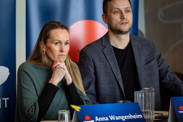 <p>Candidates from the Demokratit party Anna Wangenheim (L) and Jens-Frederik Nielsen address voters attending an all party political meeting at the university in Nuuk, Greenland</p>