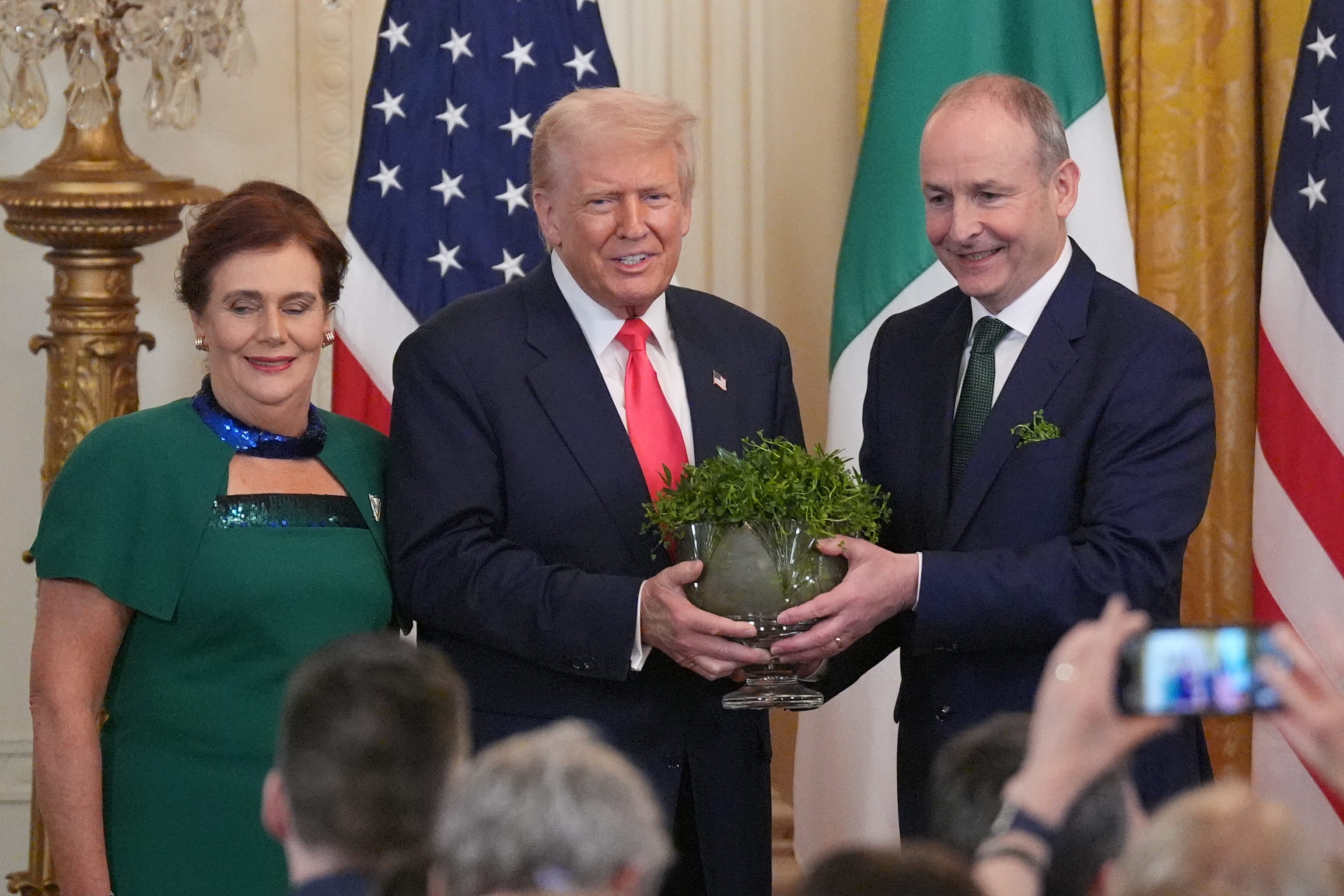 Taoiseach Micheal Martin and his wife Mary with US President Donald Trump (Niall Carson/PA)