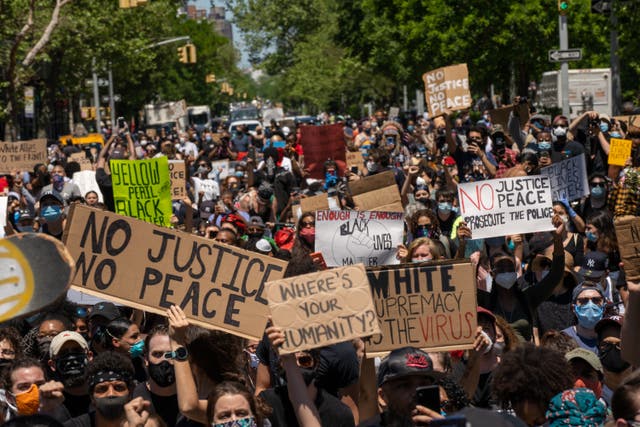 <p>Protesters gather in Harlem, New York, to protest the death of George Floyd</p>