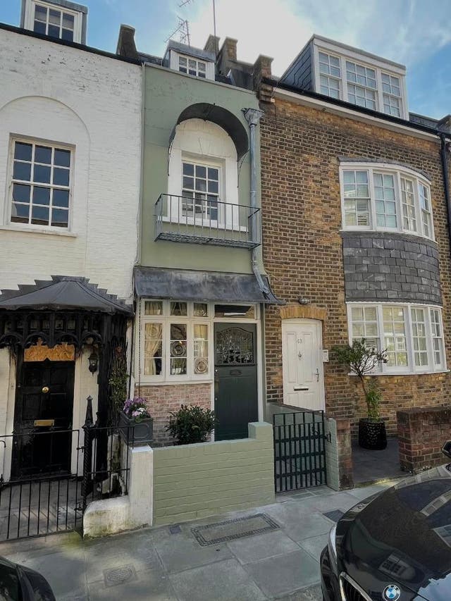 <p>The three-storey property can be found squeezed between its neighbours on Peel Street, Notting Hill</p>