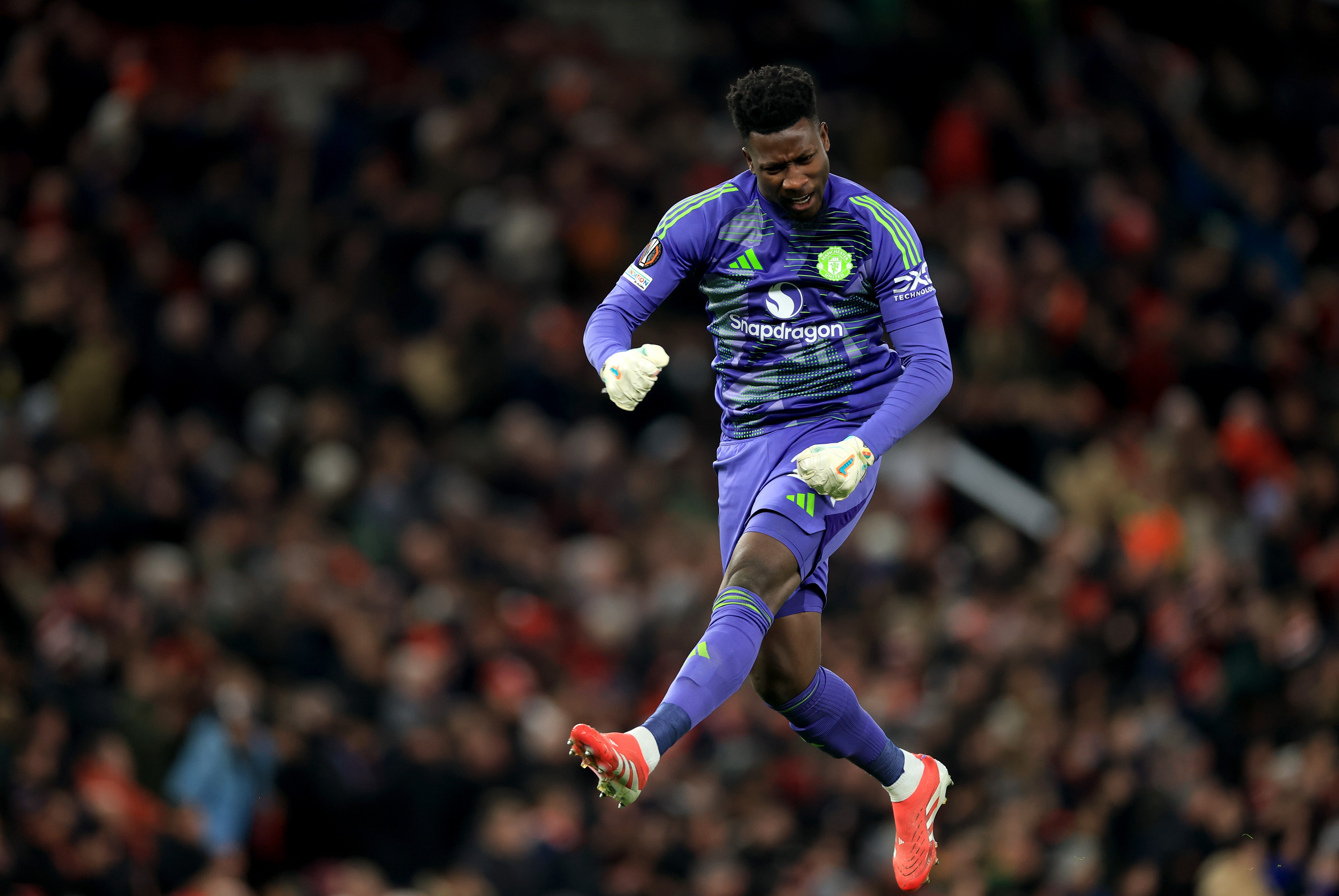 Andre Onana celebrates after Bruno Fernandes scores