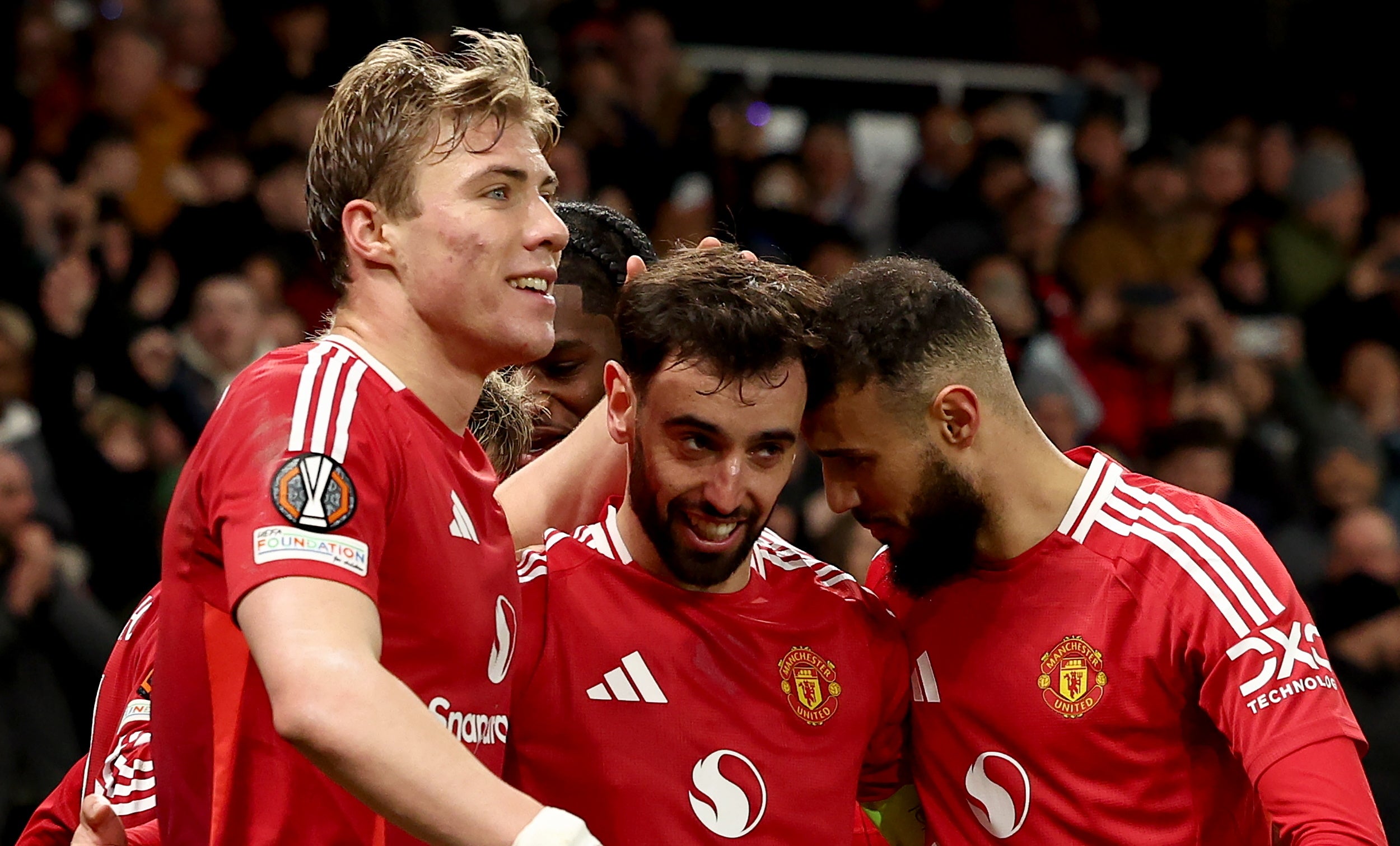 <p>Bruno Fernandes, centre, of Manchester United celebrates with teammates</p>