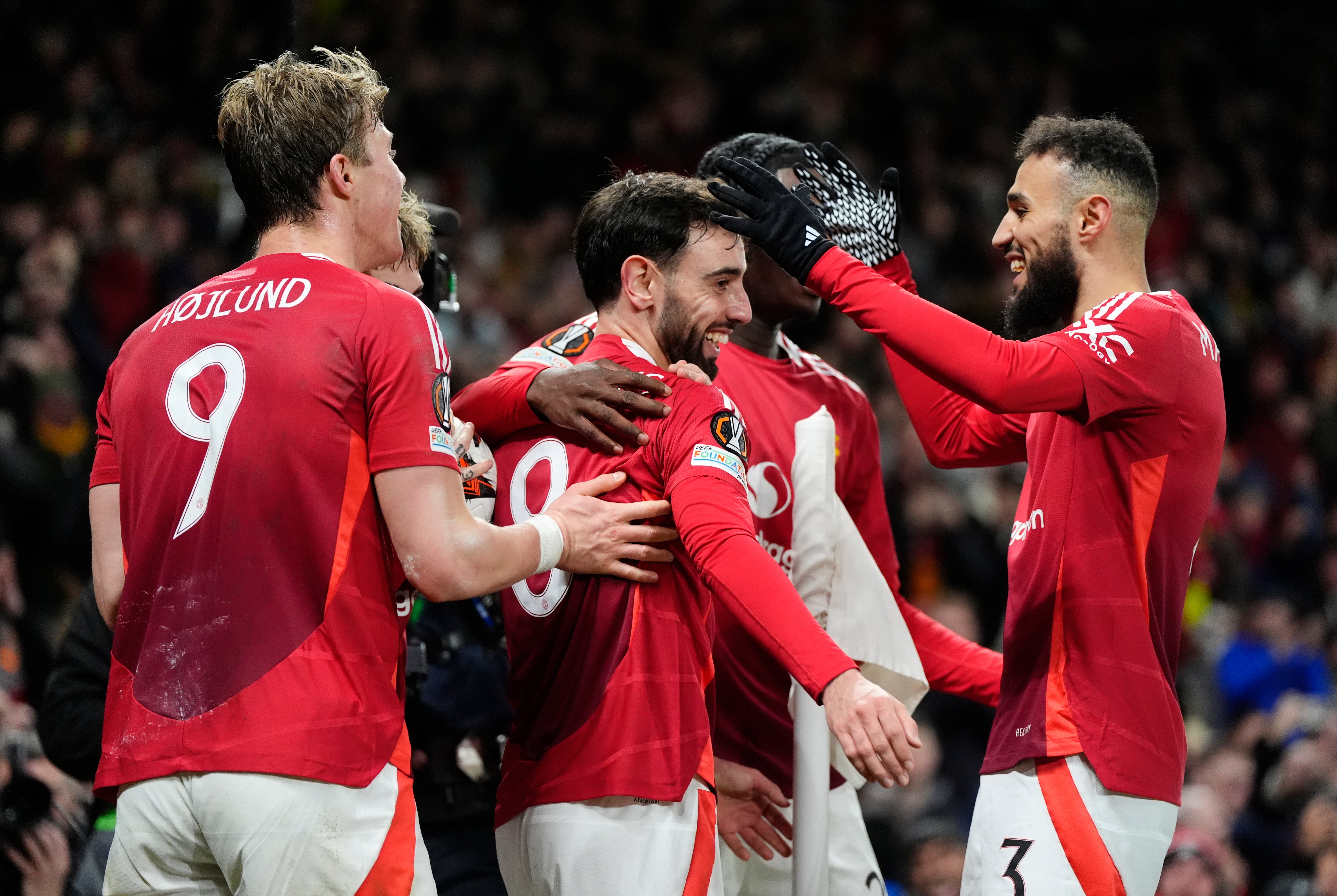 Manchester United's Bruno Fernandes (centre) celebrates with team-mates after scoring