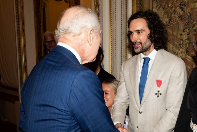 The King meets Joe Wicks (Aaron Chown/PA)