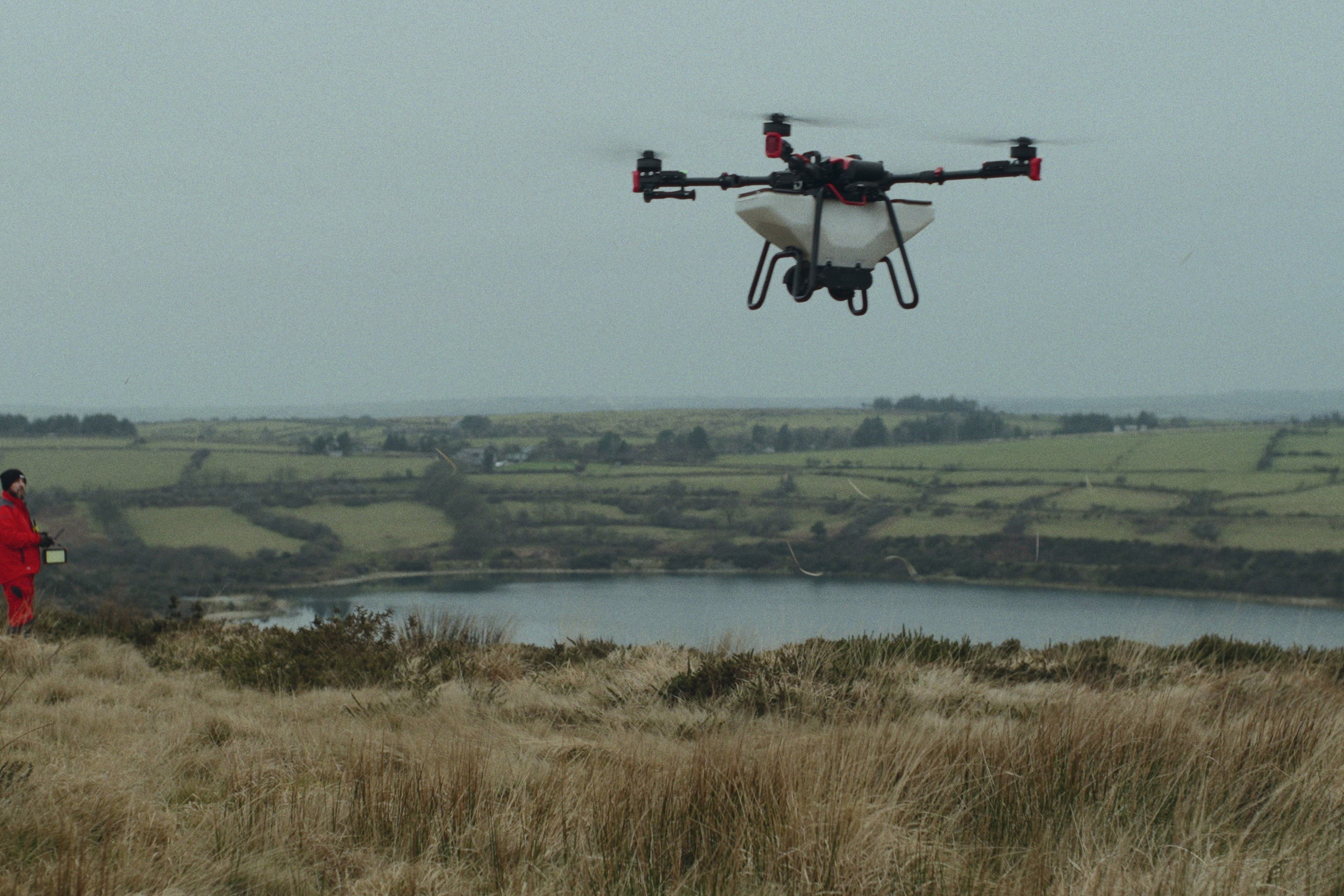 The drone flying over the uplands for seed dispersal (HereNowFilms/PA)