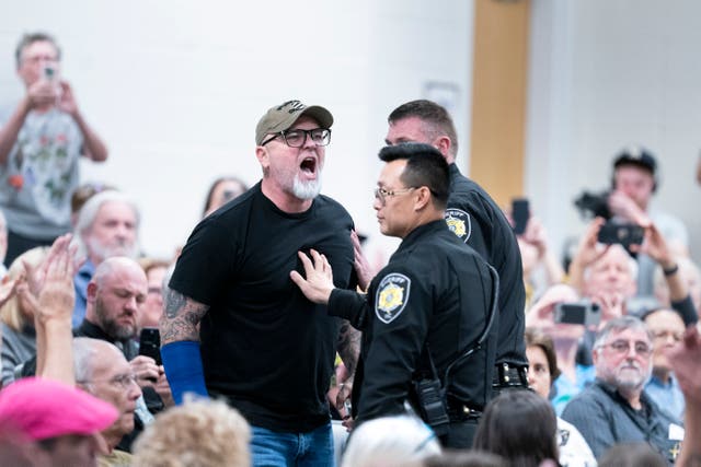 <p>A man who was escorted out of a town hall held by North Carolina Rep. Chuck Edwards says he ‘wasn’t going to be silenced’</p>