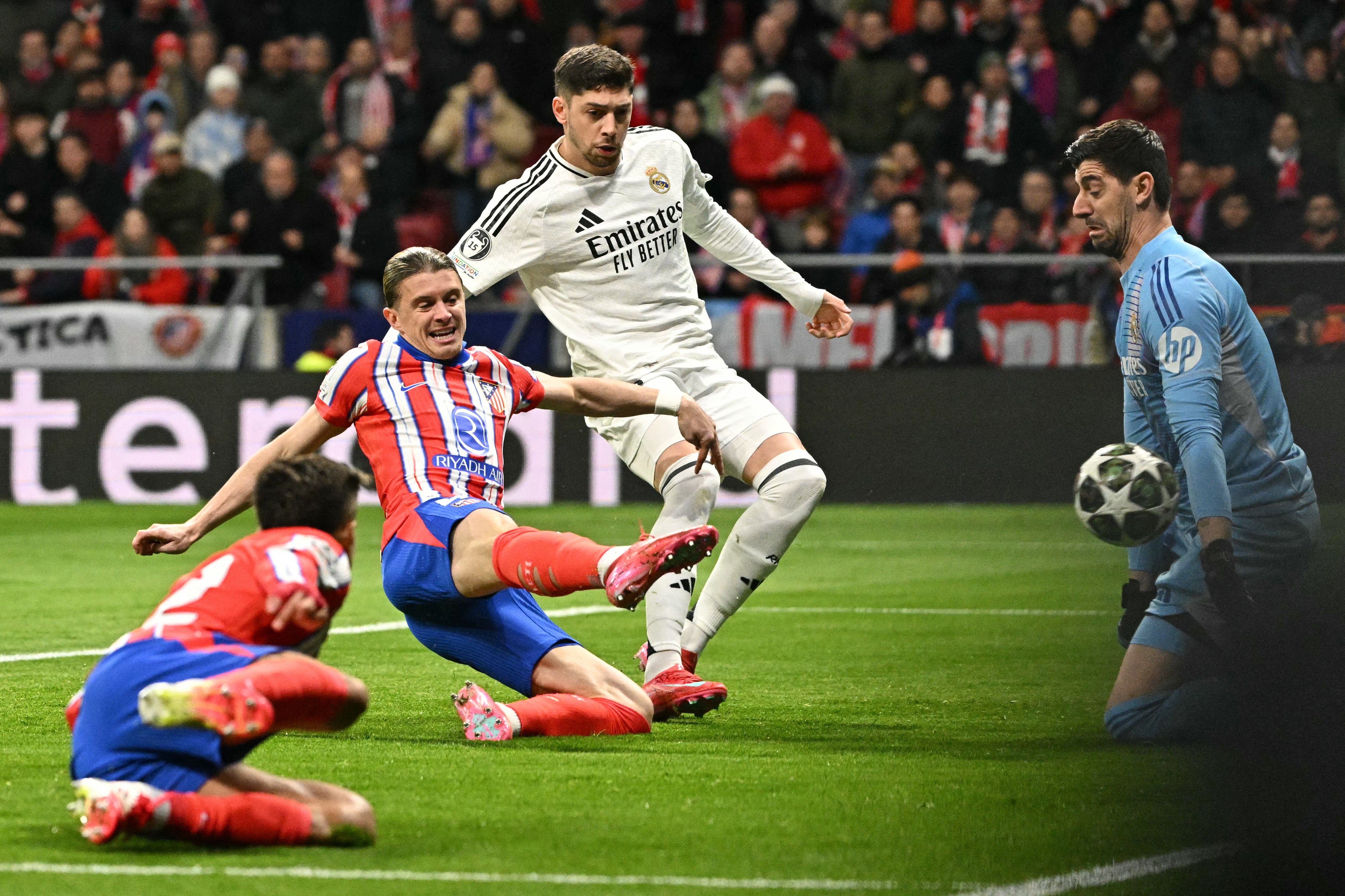 Atletico Madrid's English midfielder #04 Conor Gallagher scores the opening goal