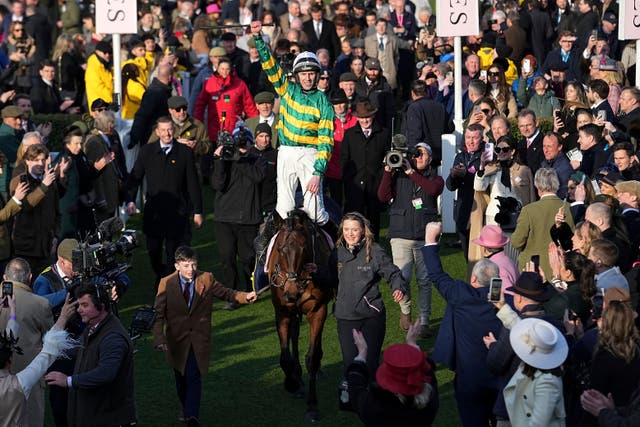 <p>Inothewayurthinkin, trained by Gavin Cromwell and ridden by Mark Walsh, won the Cheltenham Gold Cup in front of a sell-out crowd</p>