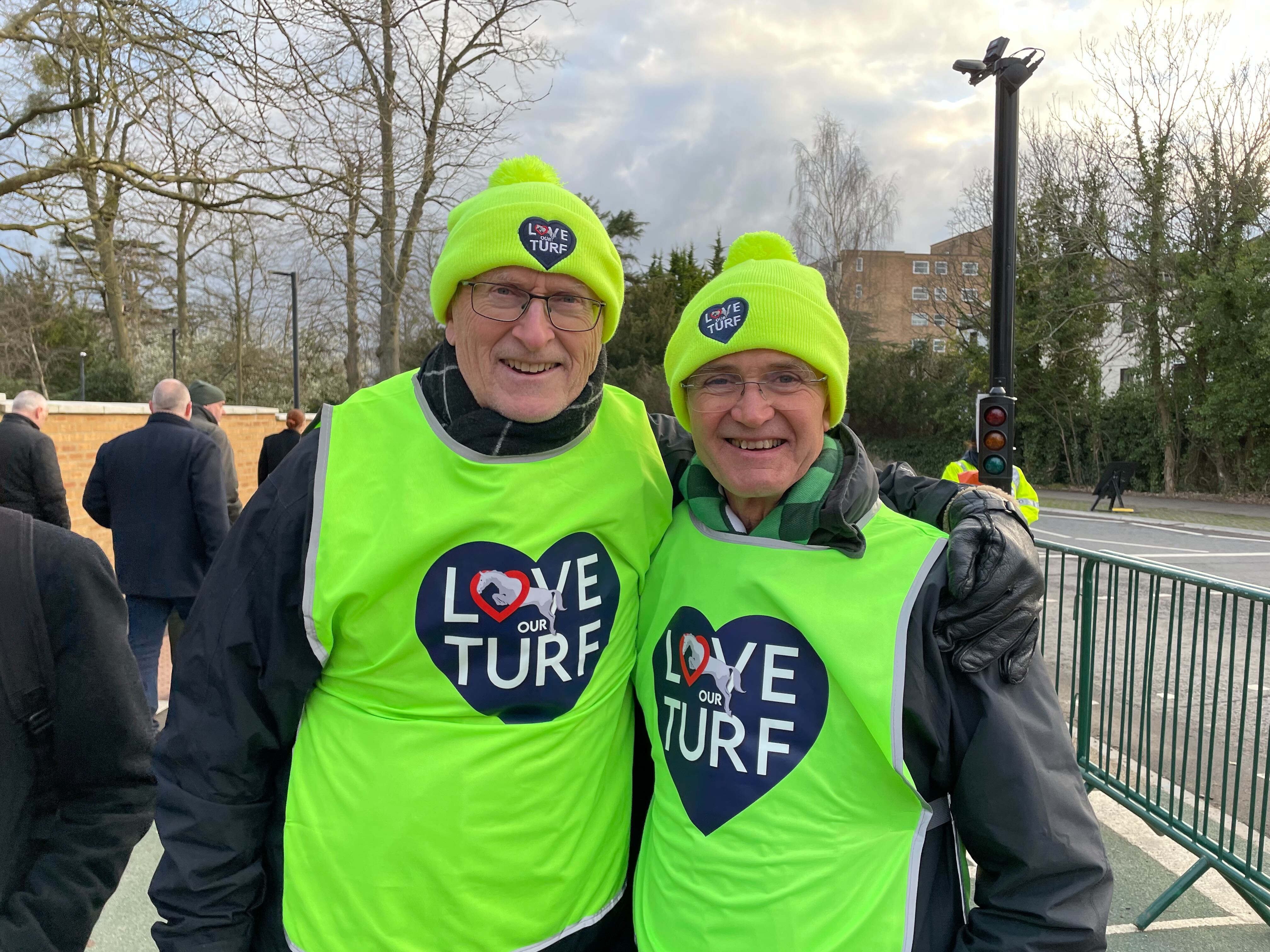 Volunteers David Hurle and David Price help with the Love our Turf campaign outside the racecourse