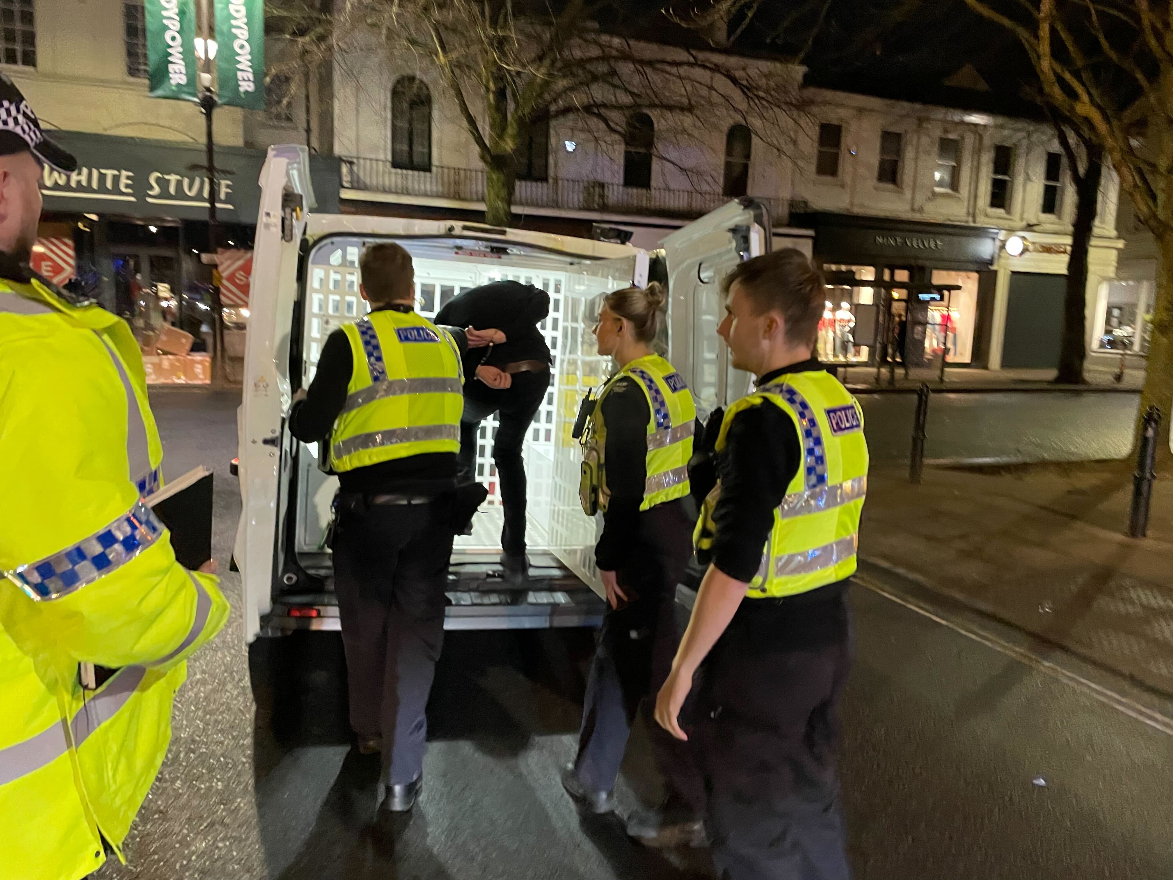 <p>Police detain a man arrested on suspicion of assault following a fight in a bar in Cheltenham town centre </p>