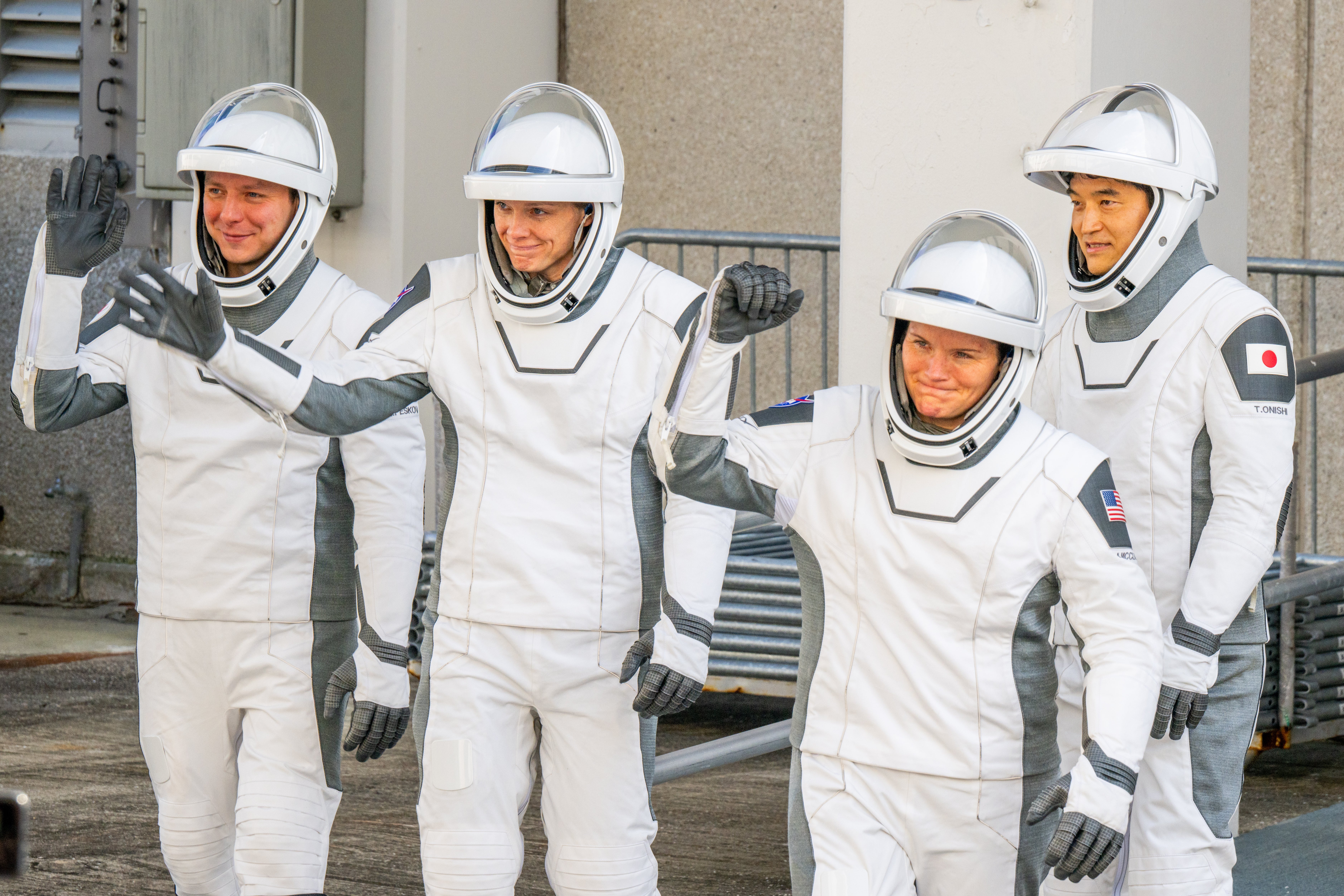 NASA astronauts commander Anne McClain and pilot Nichole Ayers, alongside mission specialists, Japan Aerospace Exploration Agency astronaut Takuya Onishi and Roscosmos cosmonaut Kirill Peskov, are seen waving at NASA’s Kennedy Space Center in Cape Canaveral, Florida, on Friday. This was the second attempt at a launch for the Crew-10 astronauts