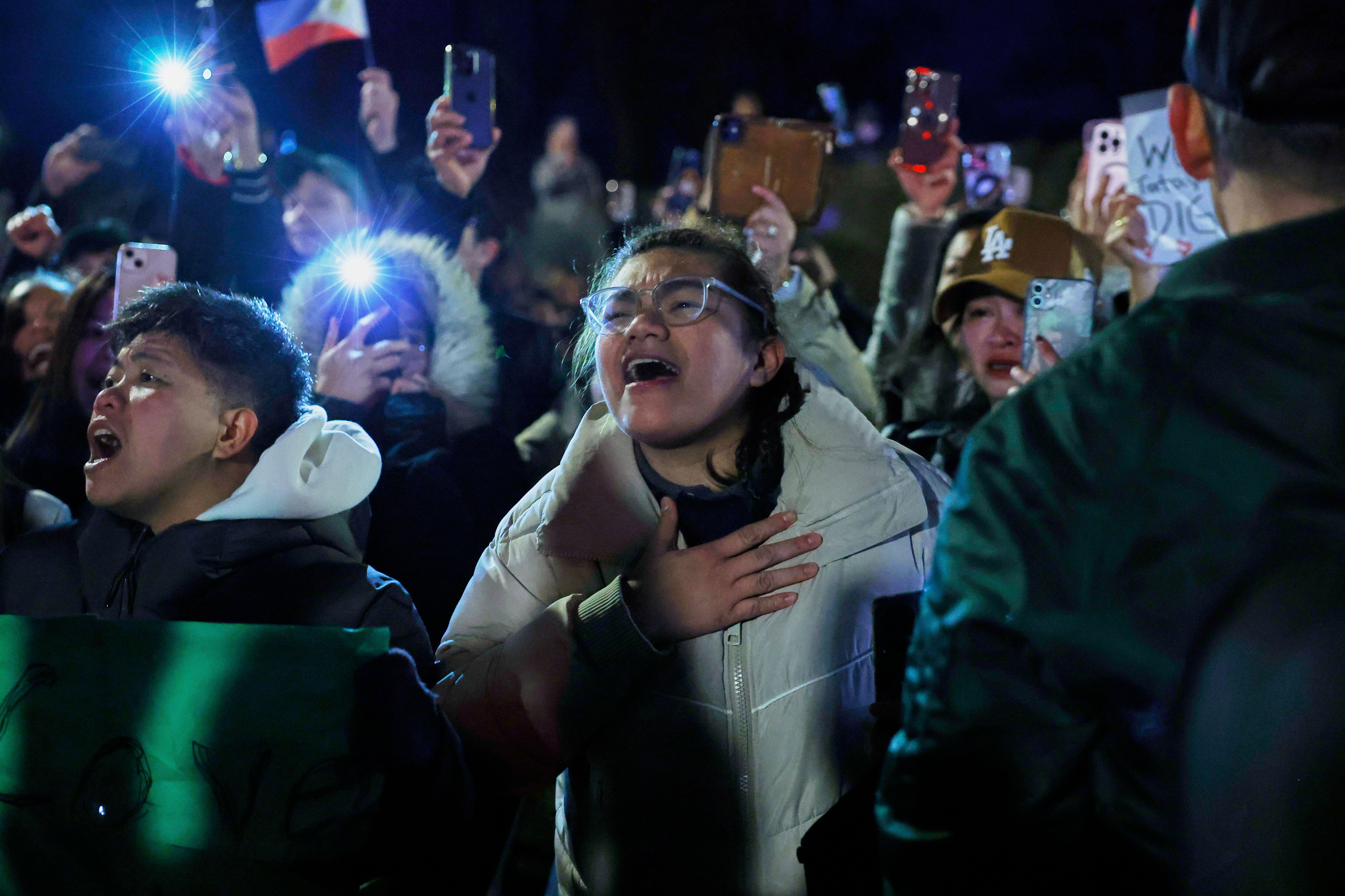 Supporters of Rodrigo Duterte protest outside the ICC detention center near The Hague in the Netherlands on Wednesday